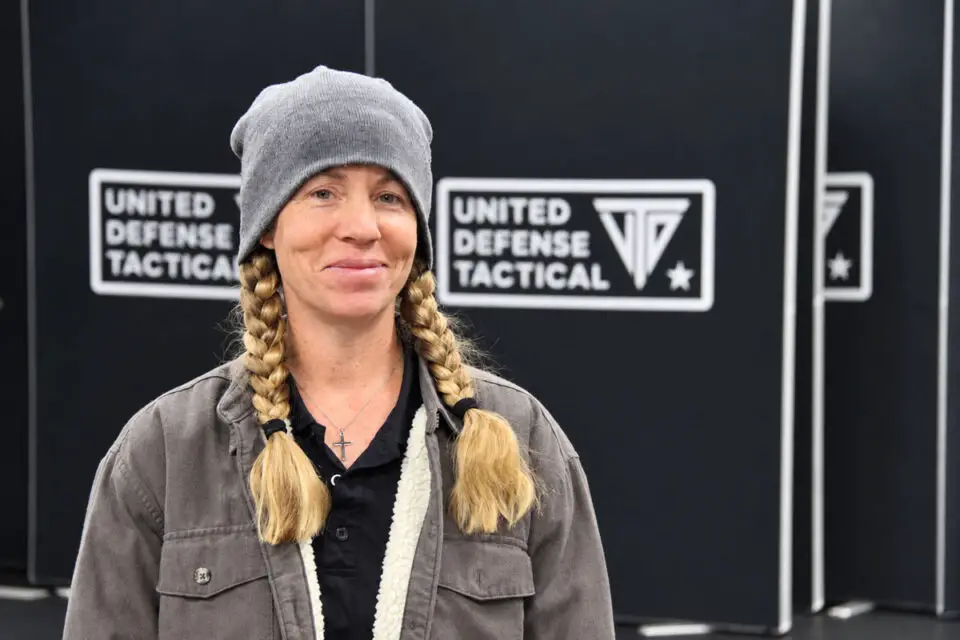 Sonya Hatch, co-owner of the San Marcos franchise of United Defense Tactical, stands in one of her business' training studios. Photo by Jim Trageser