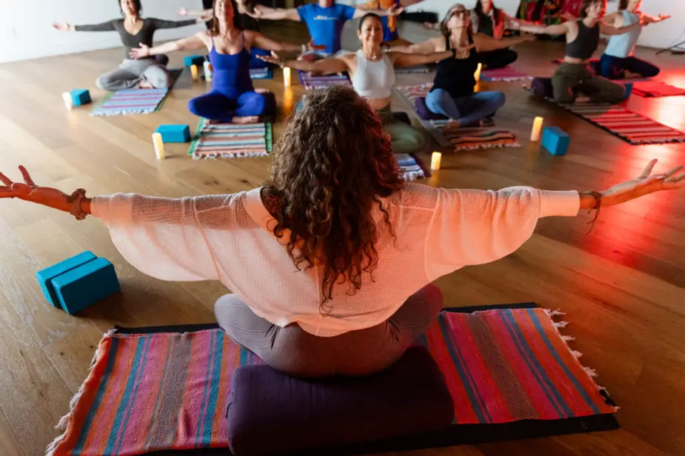Participants practice yoga at Soul of Yoga in Encinitas, where classes draw on a range of yoga styles and traditions. Courtesy photo/Soul of Yoga