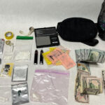 Drugs, packaging materials, a digital scale and cash seized during the arrest of a Valley Center man on suspicion of drug sales Thursday. Courtesy photo/Sheriff's Office