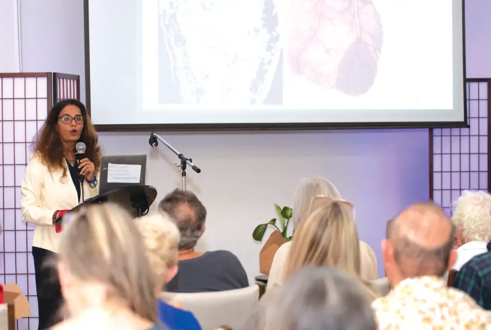 Pratiksha Gandhi, MD, addresses attendees during a previous health education gathering. Her Feb. 27 summit in Encinitas builds on three years of community events, workshops and retreats, with local businesses now invited to participate as sponsors and exhibitors. Courtesy photo