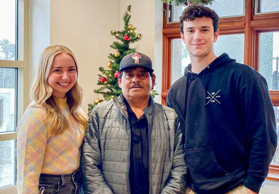Santa Fe Christian students Sandy Cameron and Dante Rotchfor, launched a fundraiser to help custodian Clemente Mejia