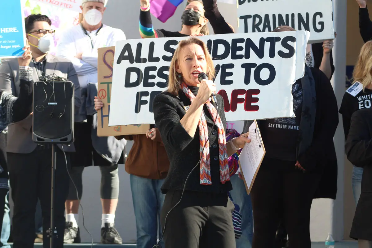 Mayor Catherine Blakespear said the "dehumanizing of others for their race, sexuality, religion or for any reason leads to gun violence" during a rally on Monday morning at San Dieguito Academy in Encinitas. 