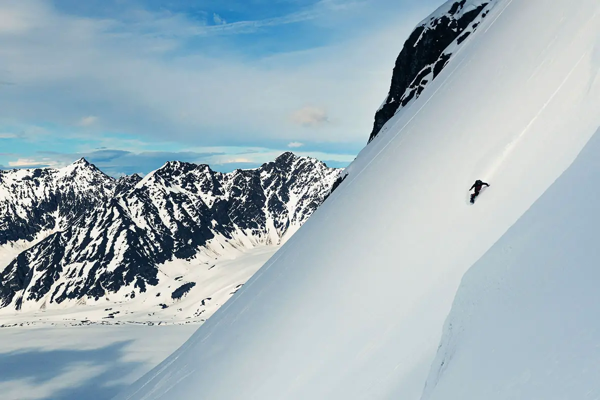 The Chugach Mountain Range in southern Alaska dwarfs professional snowboarder Ryan Hudson, who stars in “Mountain Revelations.” The film, which premiers Oct. 27 at La Paloma Theatre, follows three snowboarders as they explore how their varied backgrounds led them to the sport. Courtesy photo