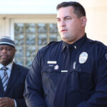 Lt. Reid Shipley, of the Carlsbad Police Department, along with Yusef Miller, of North County Equity and Justice Coalition, announce the law enforcement's new de-escalation policy during a press conference on Oct. 28 in Carlsbad. Steve Puterski