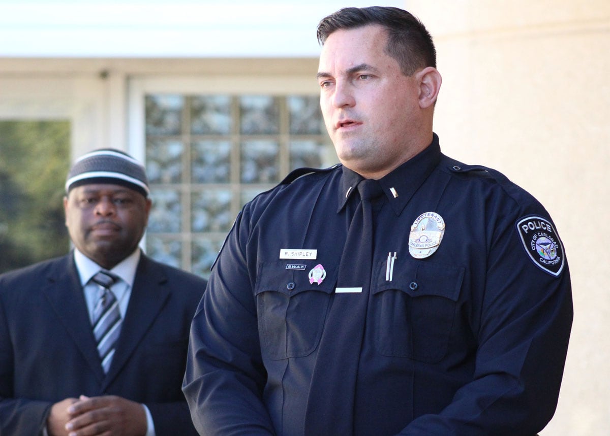 Lt. Reid Shipley, of the Carlsbad Police Department, along with Yusef Miller, of North County Equity and Justice Coalition, announce the law enforcement's new de-escalation policy during a press conference on Oct. 28 in Carlsbad. Steve Puterski