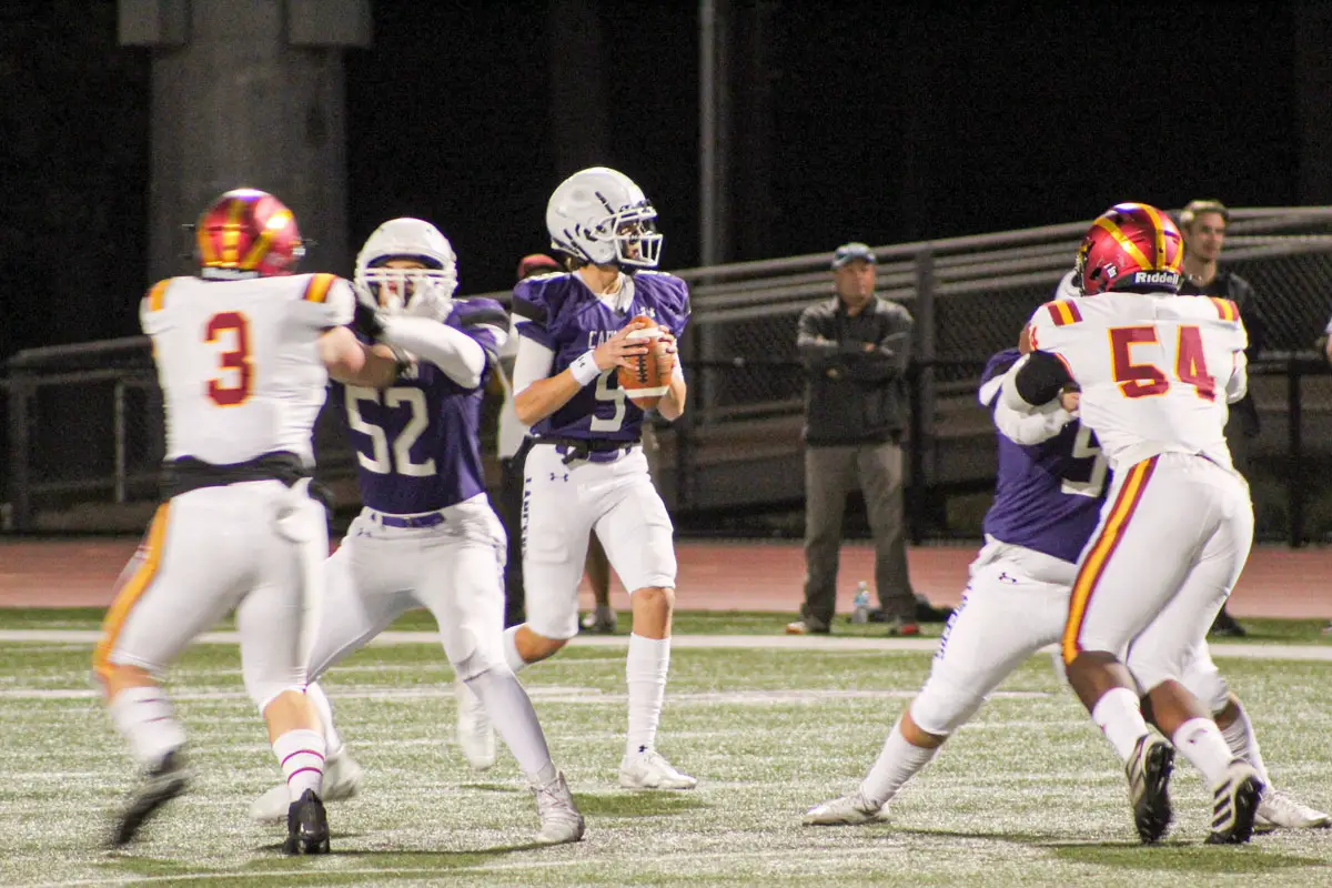 Carlsbad High School sophomore quarterback Julian Sayin looks for an open receiver during the Lancers’ 44-7 win over Torrey Pines on Nov. 12 at CHS. Steve Puterski