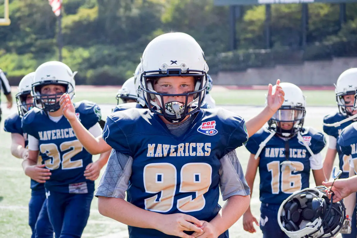 mavericks lineman Lucas Obligado, 10, heads off the field during a Pop Warner West Coast Conference championship game on Oct. 30 at La Costa Canyon High School in Carlsbad. Photo by Erin Margerum