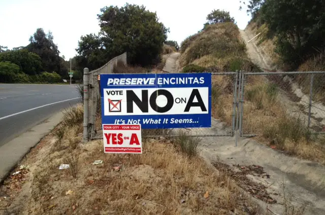Competing Prop A signs along Encinitas Boulevard in 2013. Photo courtesy of Bruce Ehlers