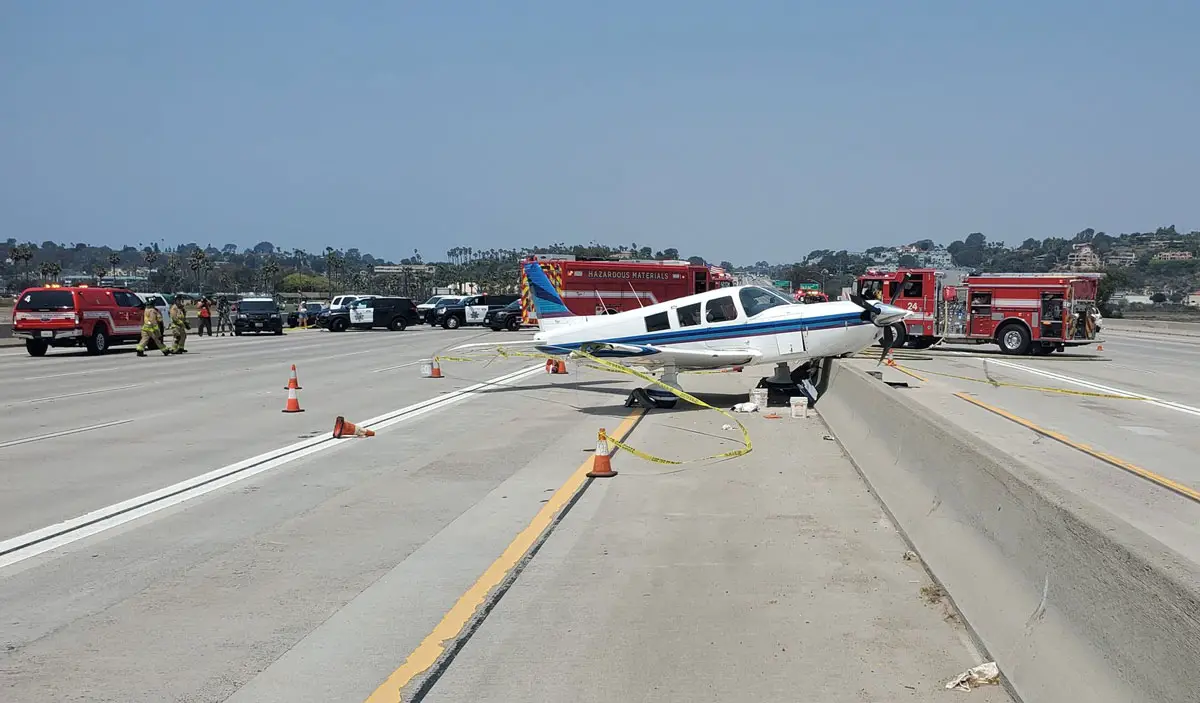 A small Piper aircraft was in the air for approximately nine minutes before making an emergency landing on Interstate 5 near Via de la Valle in del Mar. Photo courtesy of San Diego Fire Department
