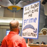Oceanside City Council Chambers were packed on the evening of Aug. 4 with people speaking either in favor or against the proposed Amazon distribution facility for Ocean Ranch industrial park. Council ended up denying the project. Photo by Samantha Nelson