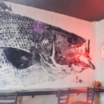 Wrench & Rodent Seabasstropub in Oceanside is now home to a unique piece of art: a giant gyotaku print of a locally caught sea bass created by artist Dwight Hwang.