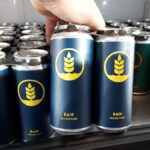 Buying beer at the source, such as this four-pack of Rain Unfiltered Pilsner at Pure Project in Carlsbad, is among the author’s beeresolutions in 2022.